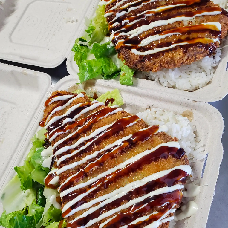 two ahi katsu plates with rice and salads from Ken's Fresh Fish in Kahuku, one of the best restaurants on the North Shore of Oahu