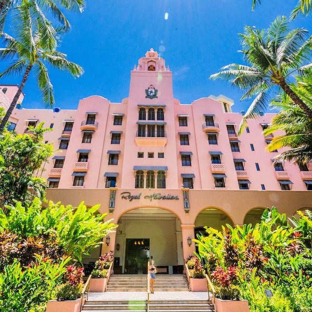 photo of the front of the Royal Hawaiian, the famed pink hotel of Waikiki