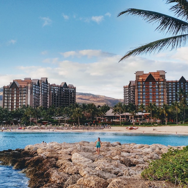 two buildings on Disney's Aulani hotel at Ko Olina, with the first Ko Olina lagoon in the foreground
