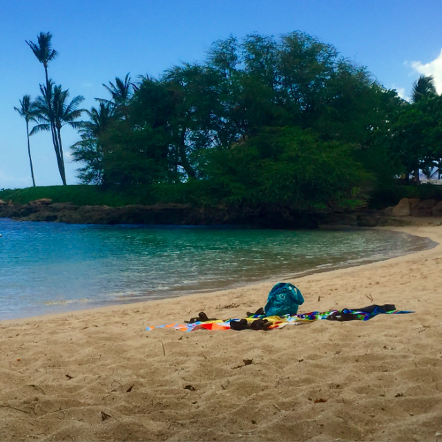 There are a couple of secret lagoons in Ko Olina, and the one by Paradise Cove is my favorite. This little area is great for snorkeling, suntanning, and swimming, making it one of the best things to do in Ko Olina.